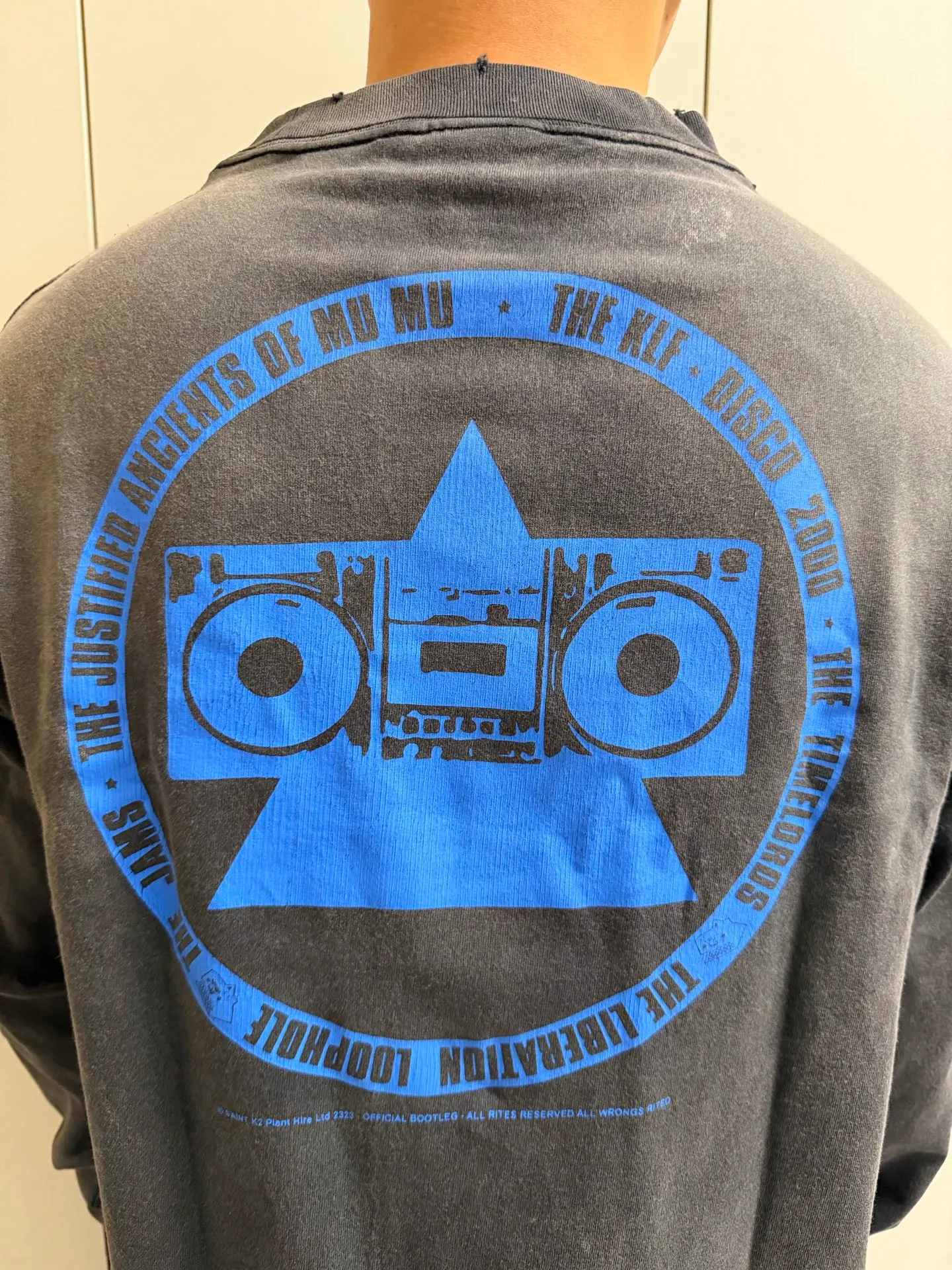 SAINT Mxxxxxx × The KLF BLUE KLF_LS TEE KLF/BLK Blue KLF tape recorder long sleeves Washed black S-XL Completely aligned Tube weaving fabric without side seams Garment dyeing Macau water fading and distressing Simulated sun washing and fading treatment Natural and perfect fading Hand-made holes and fraying Ink splashing treatment Correct main mark/wash mark/cherub anti-counterfeiting mark